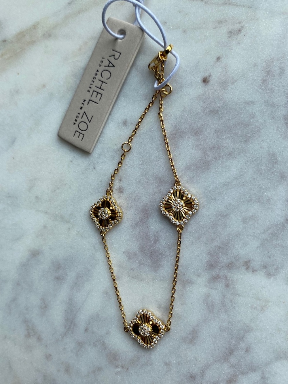 NWT Rachel Zoe gold burst & rhinetone clover bracelet